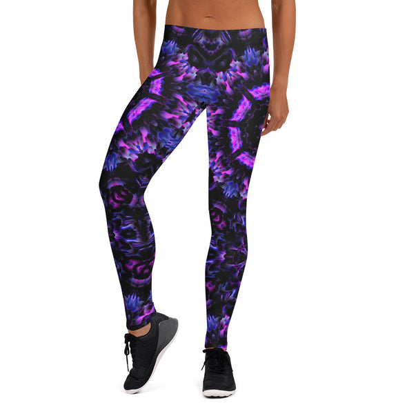 Photograph of a model wearing a unisex Bleace MetaParty Vibes Kaleidoscopic purple, blue, and pink, Trippy Visual leggings in the foreground with a white background