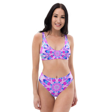 Product Photograph of a Bleace MetaParty Vibes Kaleidoscopic blue, pink and white Trippy Visual Recycled High-Waisted Bikini in the foreground with a white background.