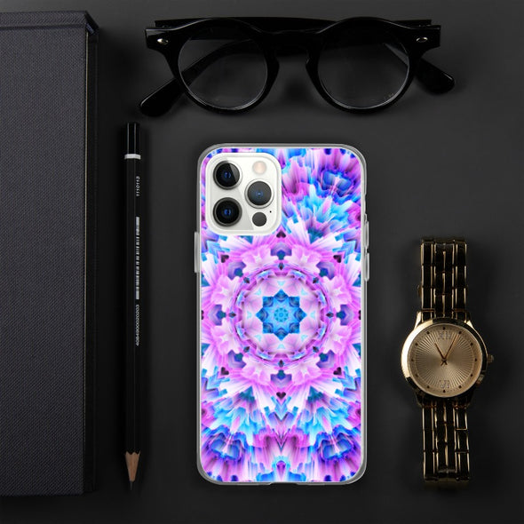 Product photograph of a Bleace Iphone case that has a kaleidoscope image made of pink, blue and purple colors in the foreground against a table backdrop next to a watch and eyeglasses.
